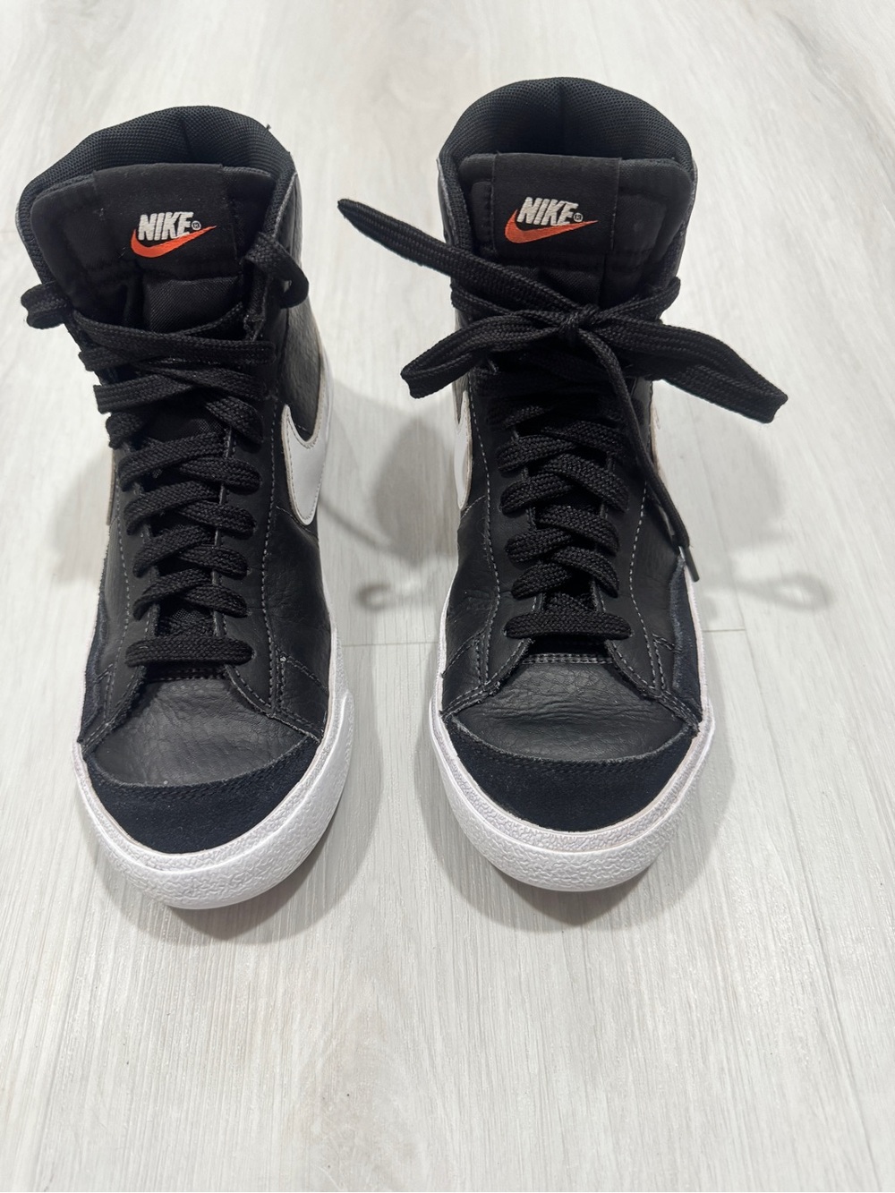 Nike High-Top Sneakers in Black and White with Orange Logo size 7.5